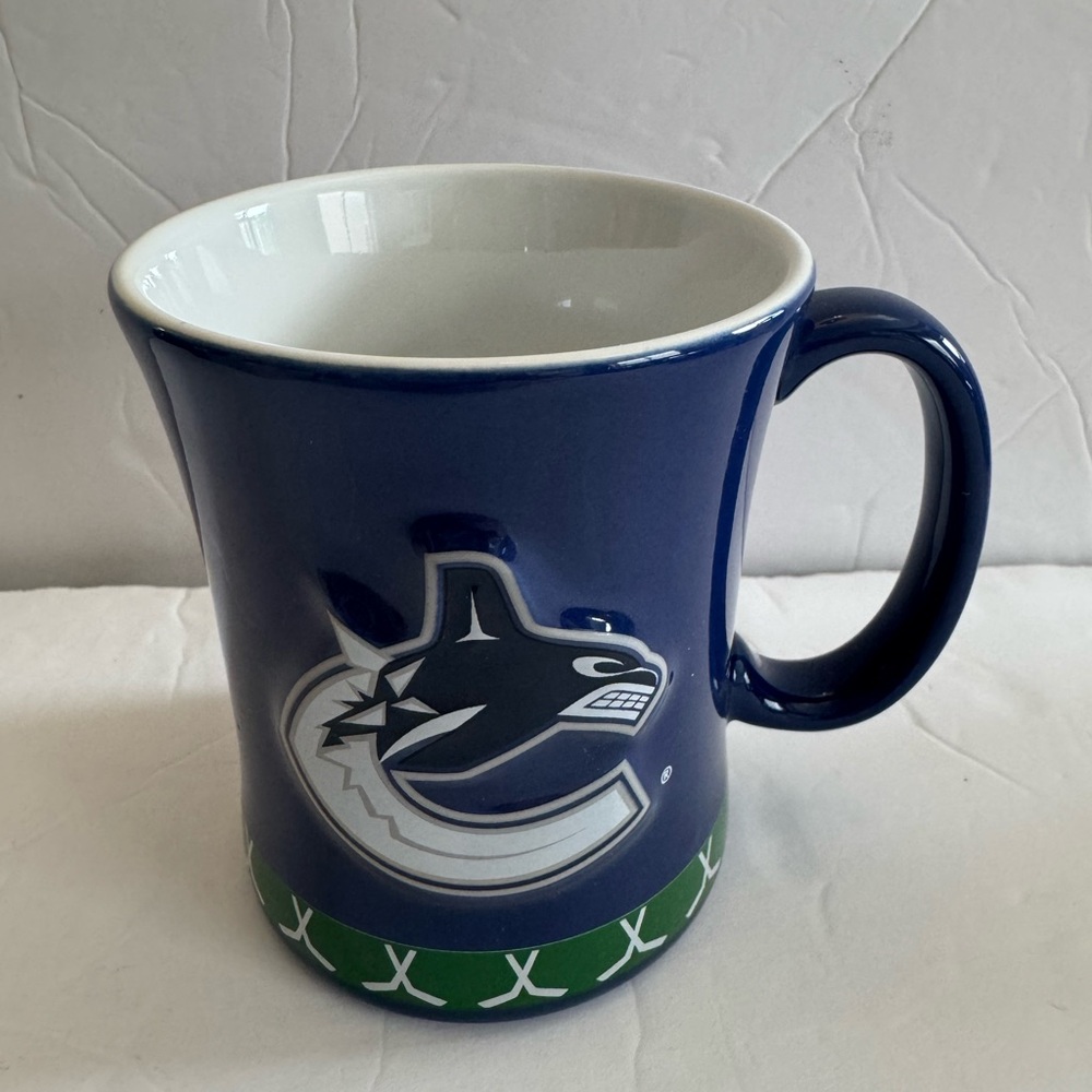 Avon 2011 NHL Slap Shot Sculpted Mug in original box Vancouver Canuck Mug New